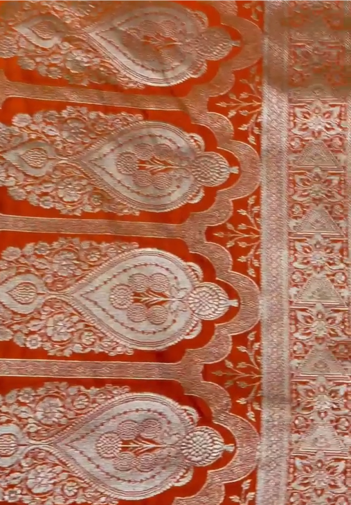 Beautiful Banarasi Mashru Silk Handloom Woven Saree featuring intricate traditional woven motifs, rich Banarasi craftsmanship, elegant border, luxurious drape, and matching blouse piece, perfect for weddings, festive occasions, and ethnic celebrations.