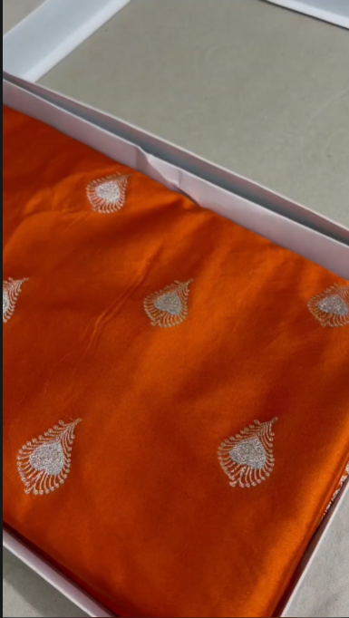 Beautiful Banarasi Mashru Silk Handloom Woven Saree featuring intricate traditional woven motifs, rich Banarasi craftsmanship, elegant border, luxurious drape, and matching blouse piece, perfect for weddings, festive occasions, and ethnic celebrations.