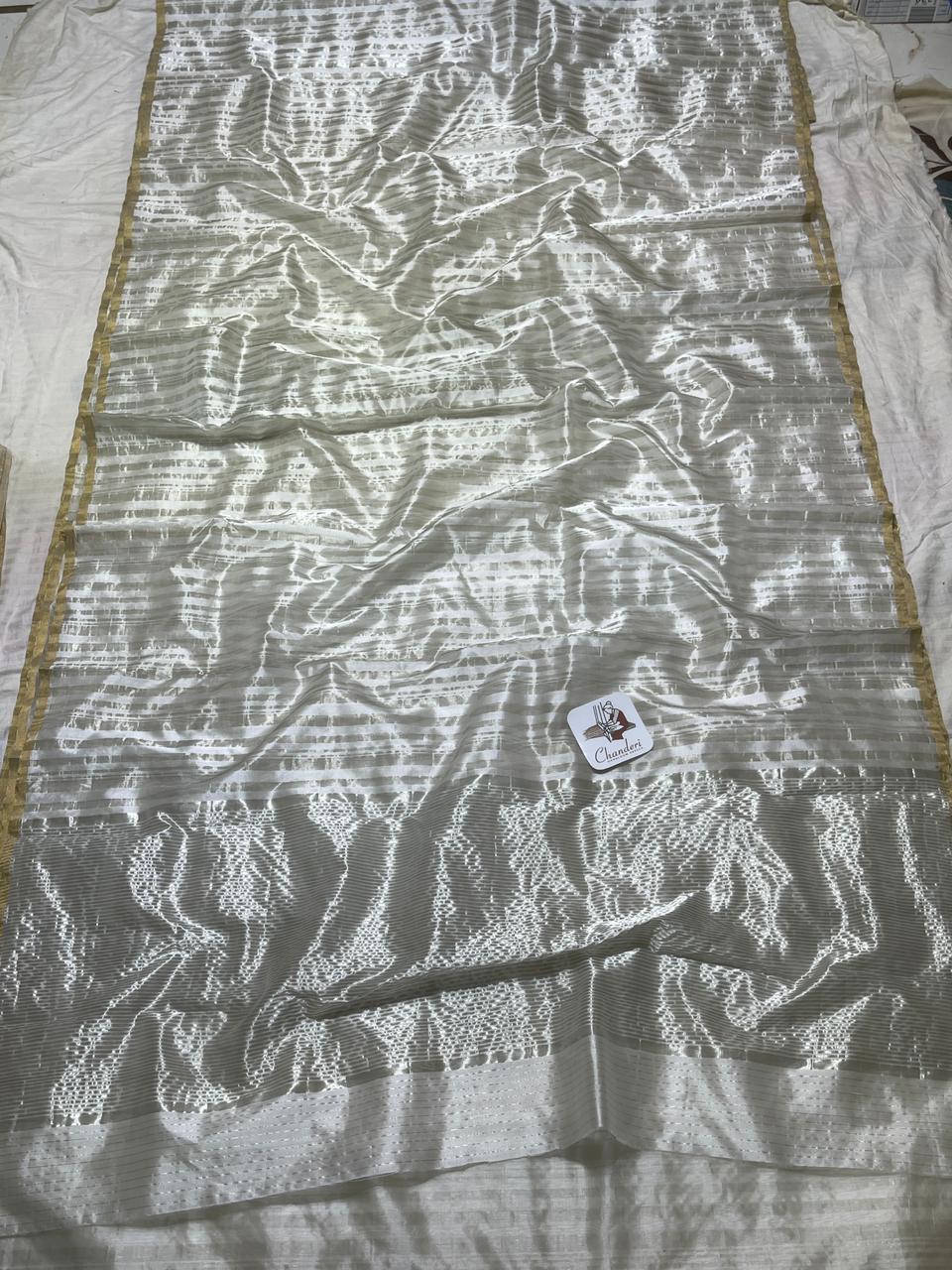 Chanderi Zari Weaving Silver And Gold Zari Strip Small Border Saree