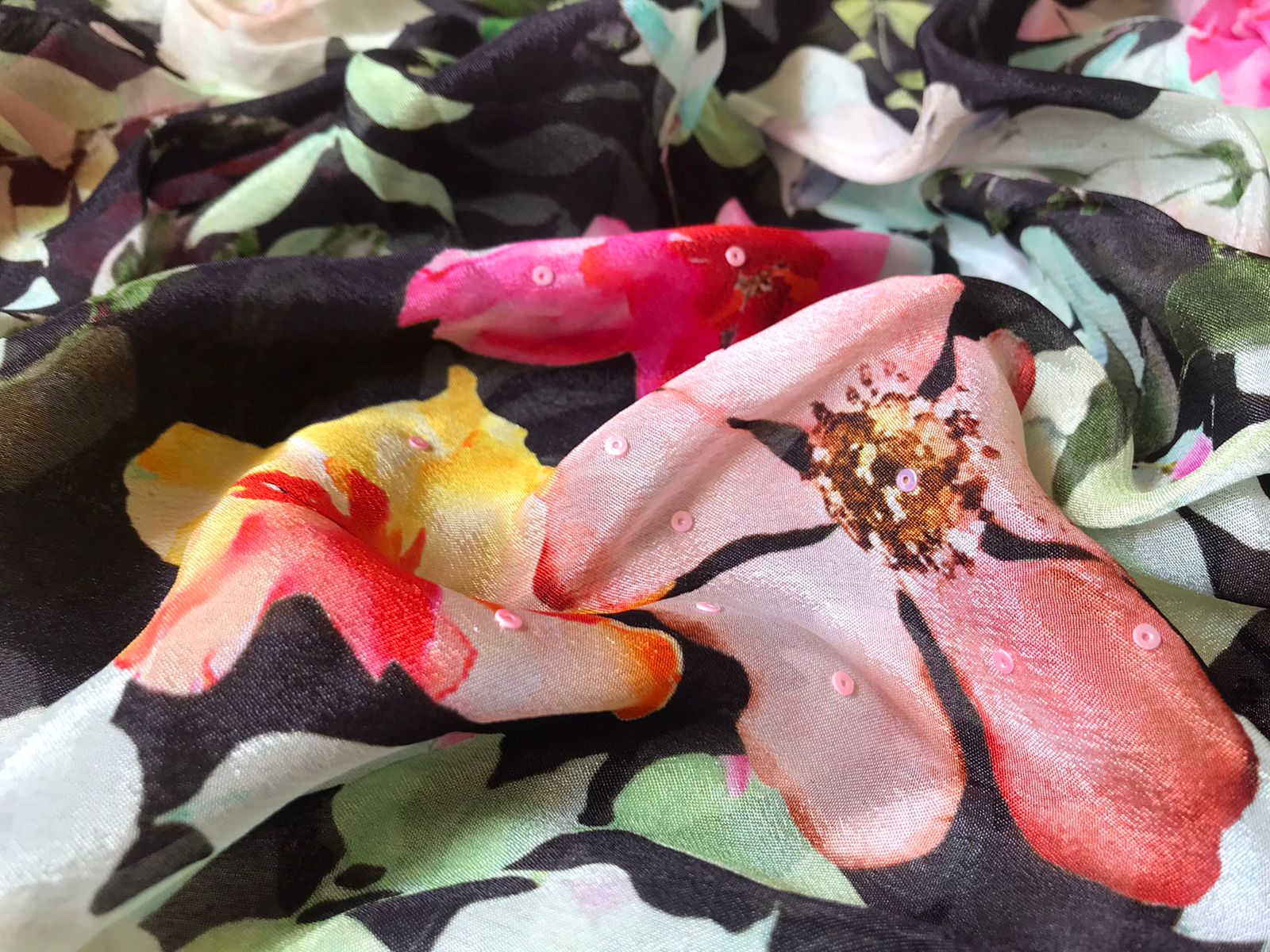 “Premium Chinnon Silk Saree with Oversized Floral Print & Pearl Cut-Dana Handwork”