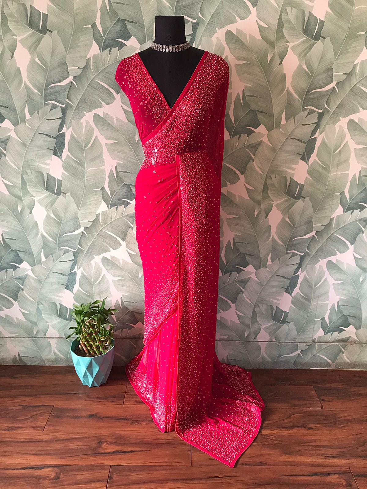 “Luxury Georgette Silk Saree with Handcrafted Pearl Sequins Detailing”