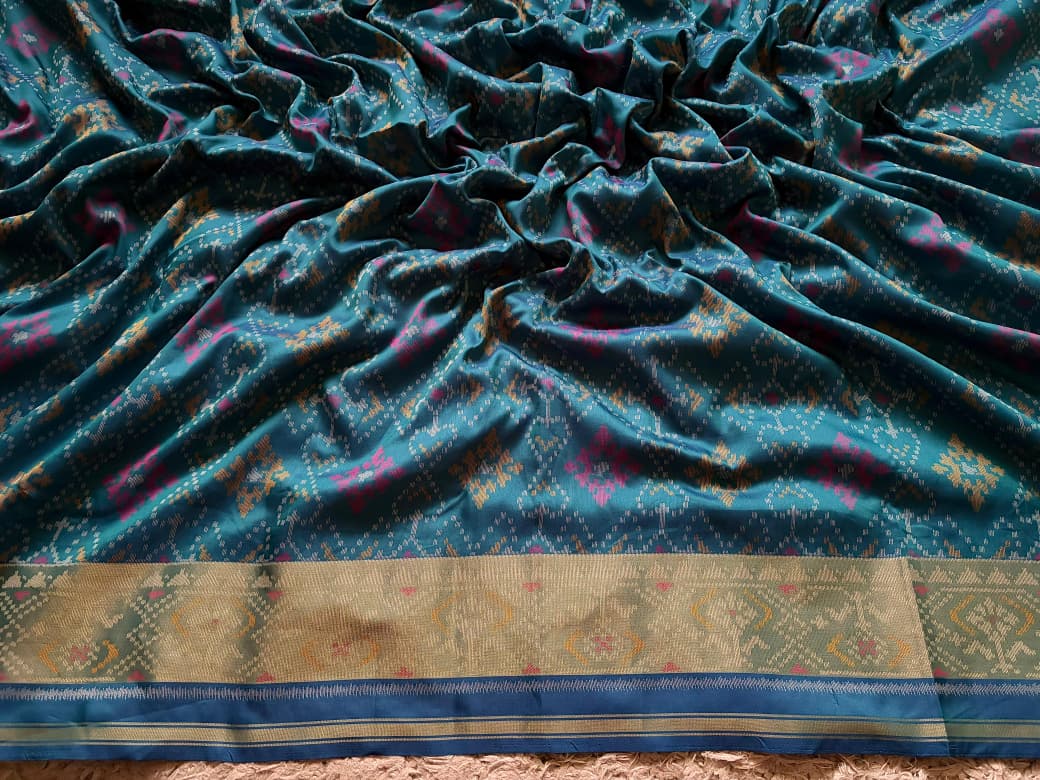 Premium Patan Patola Silk Saree with Intricate Multicoloured Weaving & Signature Patola Motifs