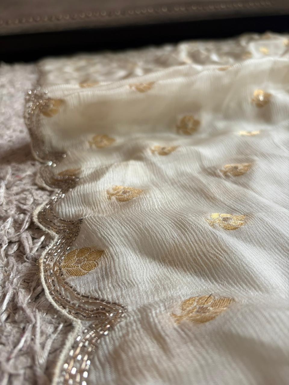 Premium pure chinnon silk saree with banarasi zari weaving motifs embellished with zardozi cut daana handwork & heavy jaal