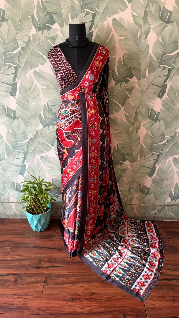 Celebrity inspired black patola silk saree embellished with contemporary gold n silver original mirror handwork