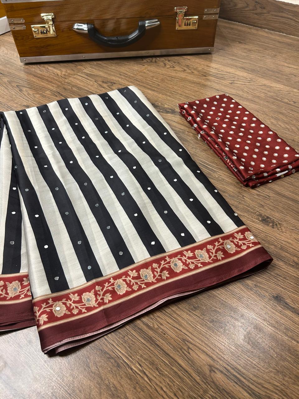 Celebrity Inspired Silky Modal Satin Silk saree embellished with contemporary stripes ajrakh print embellished with original mirror handwork & contrast heavy mirror handwork bp