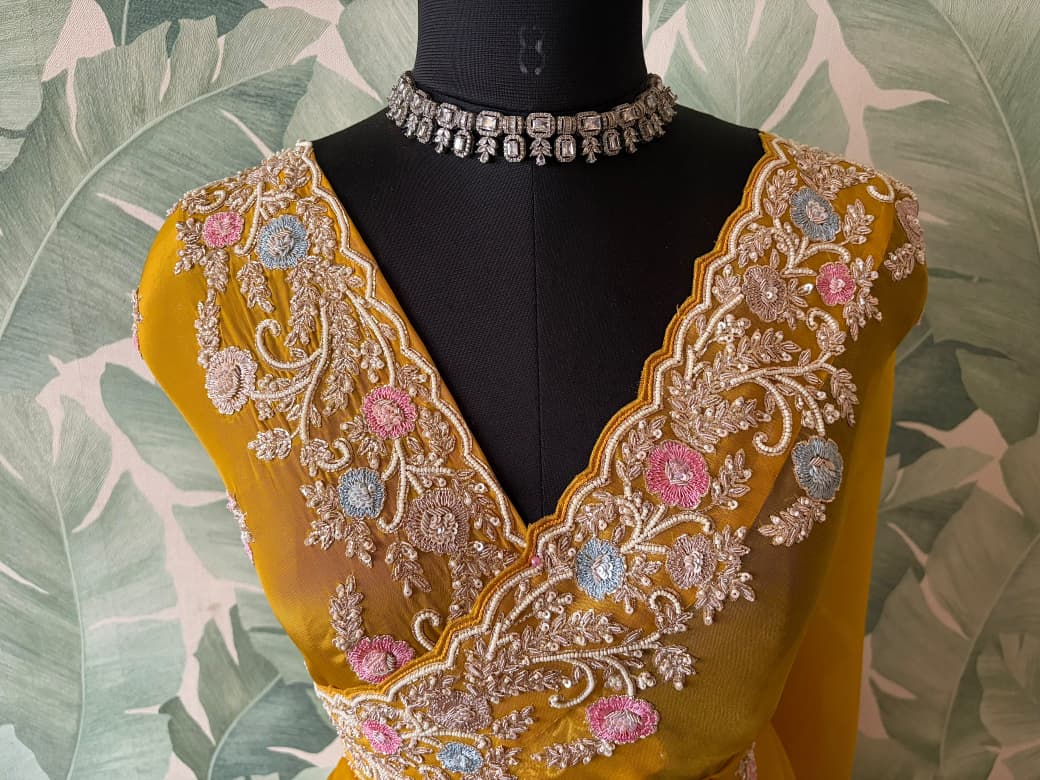 Yellow Premium Pure Organza Silk saree embellished with intricate zardozi handwork & heavy zardozi handwork bp
