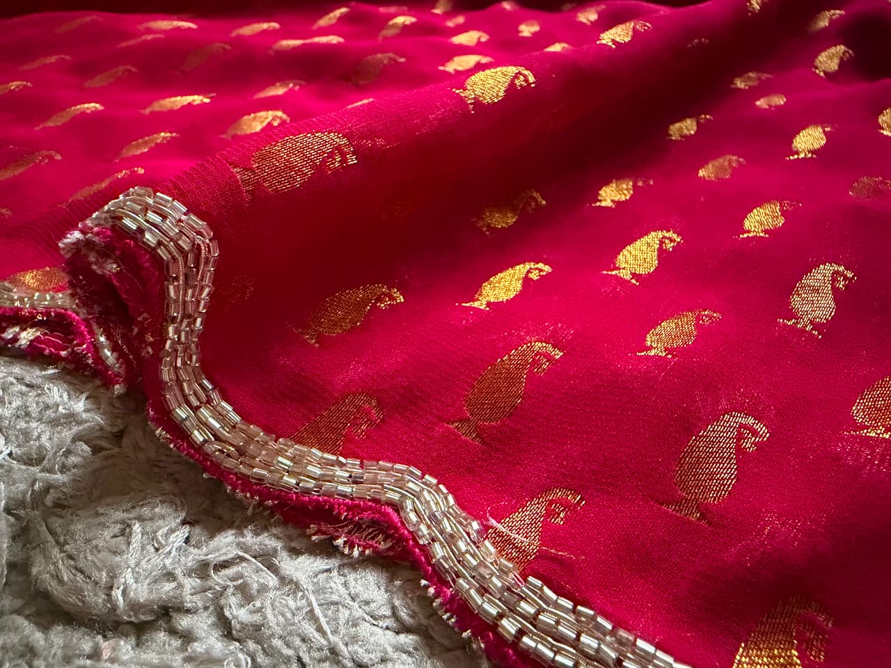 Premium Pure Georgette Silk Fuchsia Pink saree with banarasi zari weaving motifs embellished with zardozi cut daana handwork & heavy jaal handwork bp