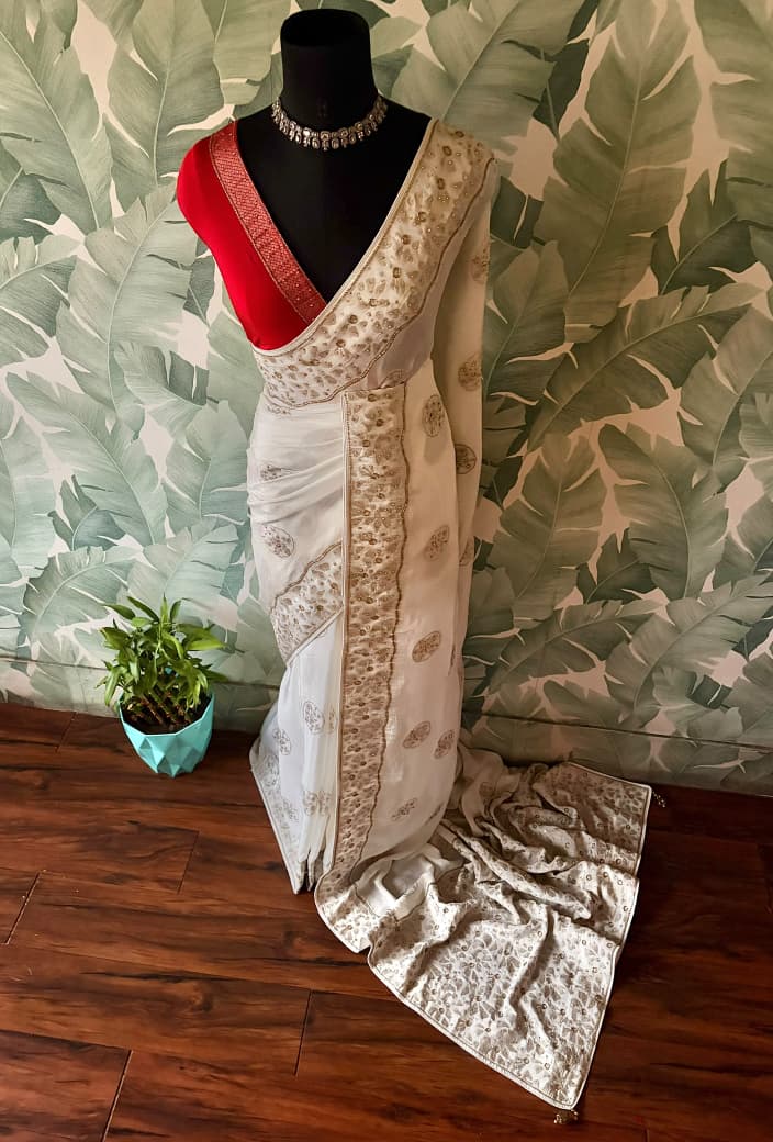 Premium Pure Chinnon Silk saree with rich banarasi zari weaving floral motifs embellished with stone cut daana handwork