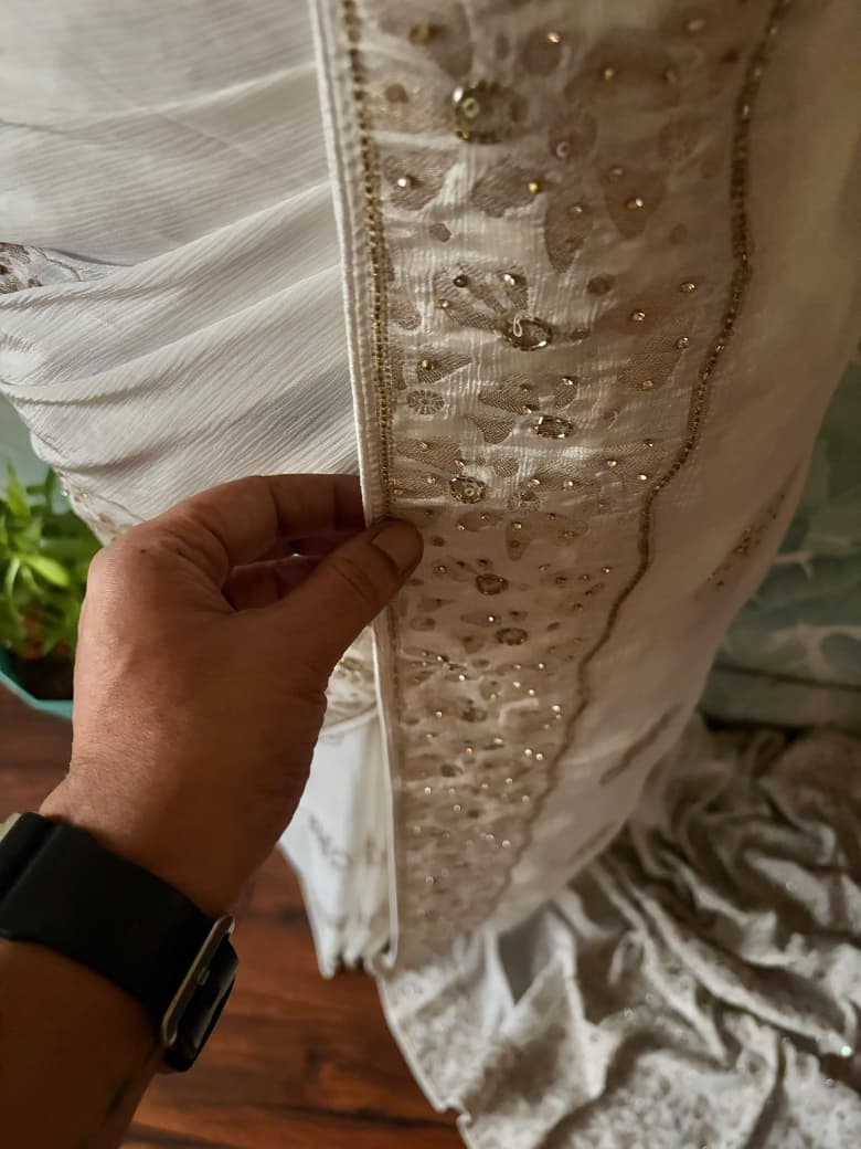 Premium Pure Chinnon Silk saree with rich banarasi zari weaving floral motifs embellished with stone cut daana handwork