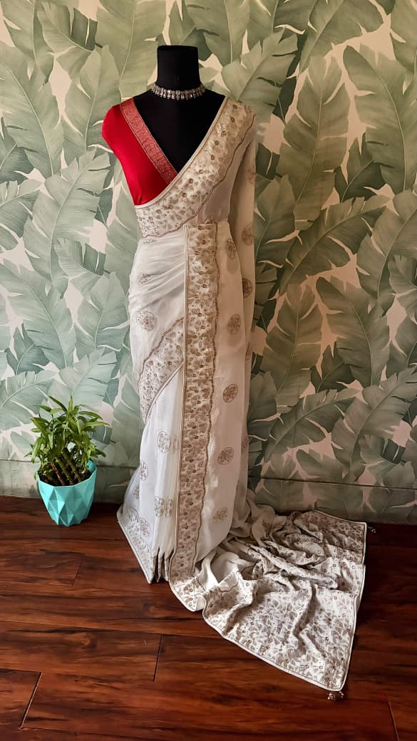 Premium Pure Chinnon Silk saree with rich banarasi zari weaving floral motifs embellished with stone cut daana handwork