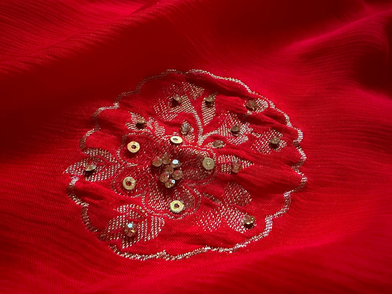 Premium Pure Chinnon Silk Red saree with rich banarasi zari weaving floral motifs embellished with stone cut daana handwork & contrast/running bp