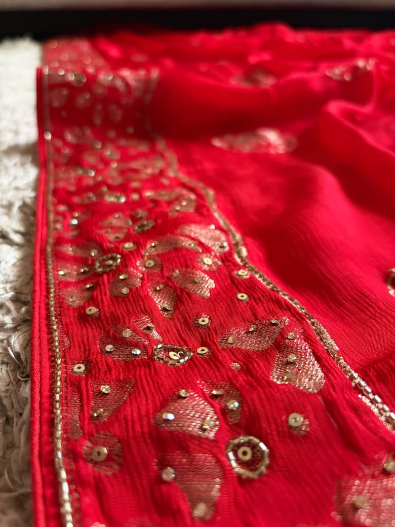 Premium Pure Chinnon Silk Red saree with rich banarasi zari weaving floral motifs embellished with stone cut daana handwork & contrast/running bp
