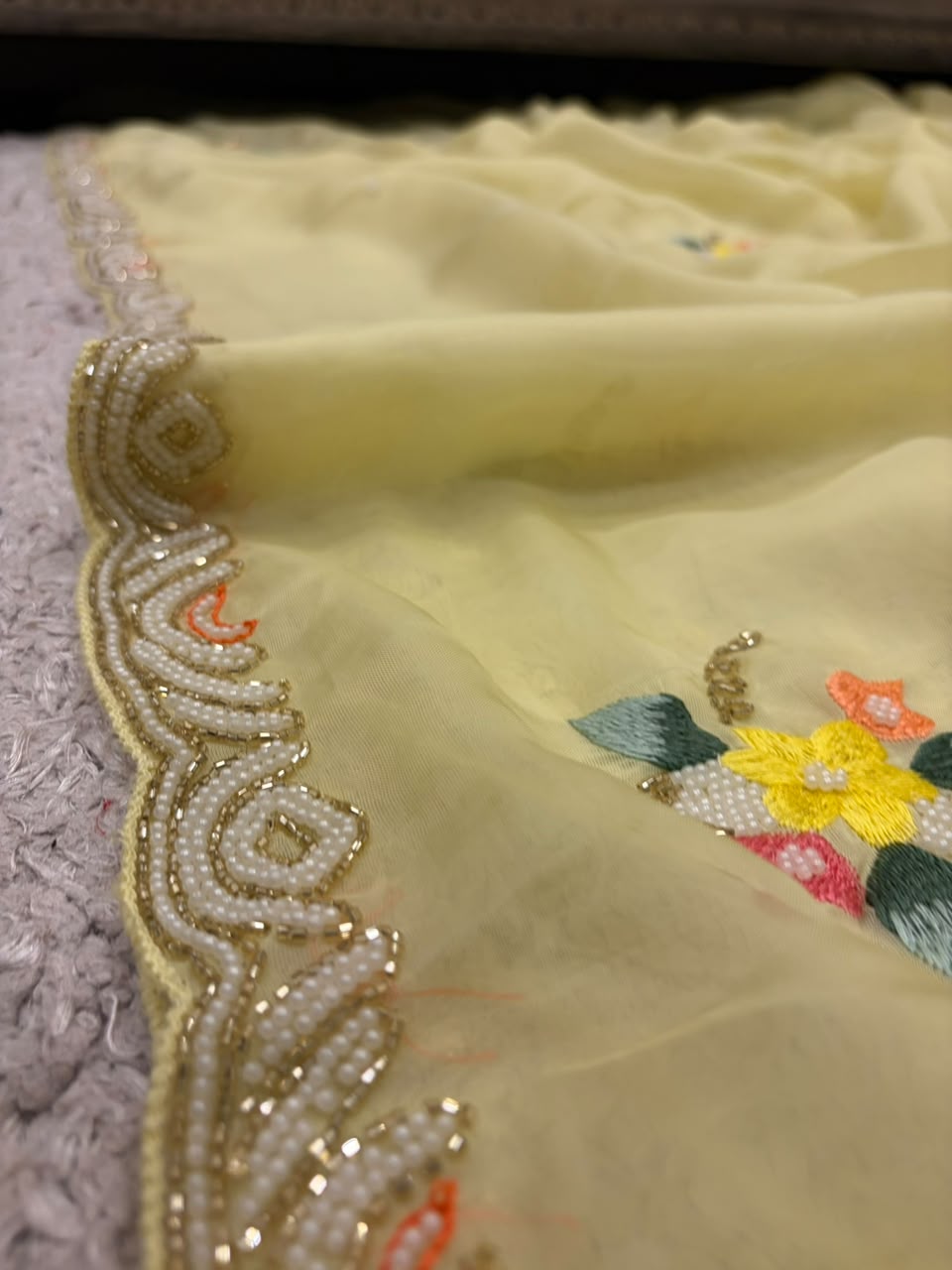 Premium Pure Yellow Organza Silk saree embellished with resham thread pearl cut daana handwork & pure Russian silk handwork