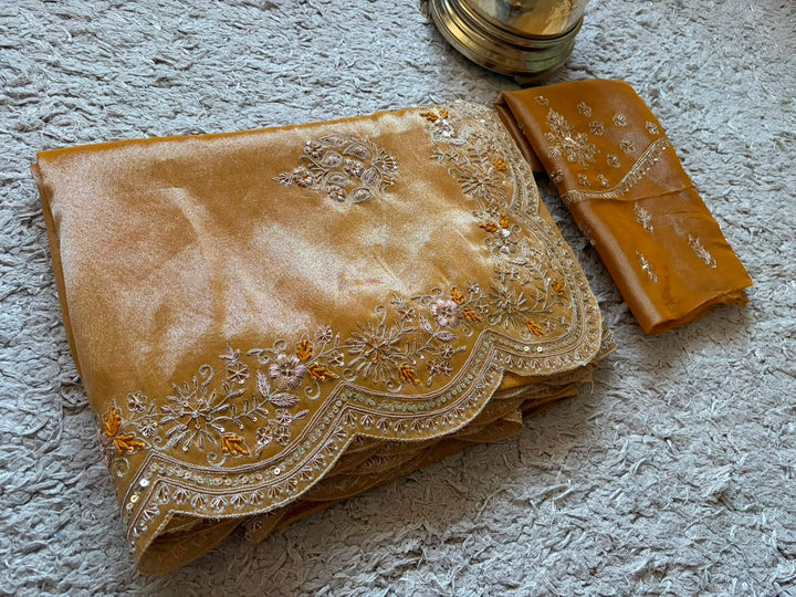 Golden Yellow Pure Zari Banarasi Tissue Silk sarees embellished with intricate zardozi handwork with running designer zardozi