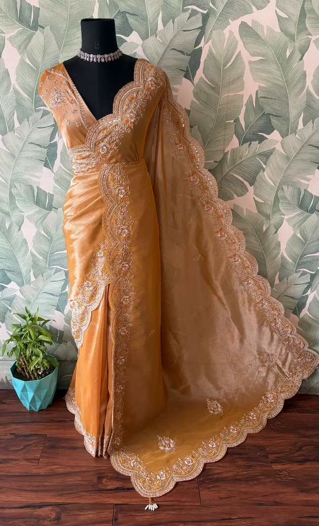 Golden Yellow Pure Zari Banarasi Tissue Silk sarees embellished with intricate zardozi handwork with running designer zardozi