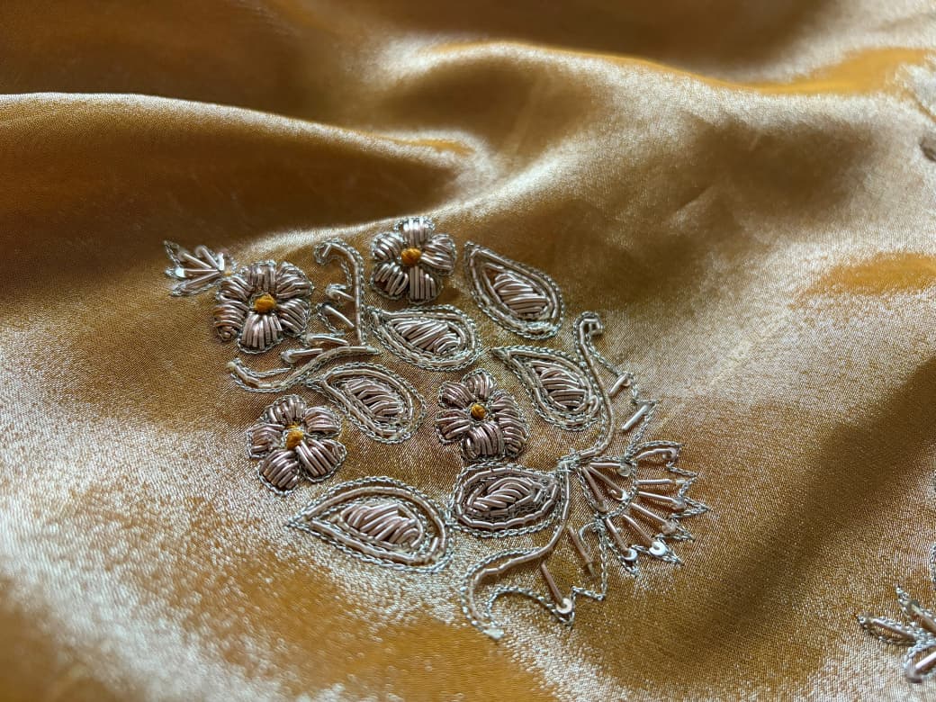 Golden Yellow Pure Zari Banarasi Tissue Silk sarees embellished with intricate zardozi handwork with running designer zardozi