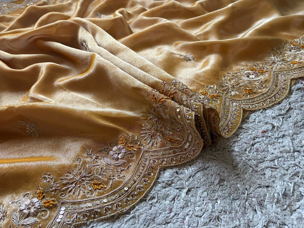 Golden Yellow Pure Zari Banarasi Tissue Silk sarees embellished with intricate zardozi handwork with running designer zardozi