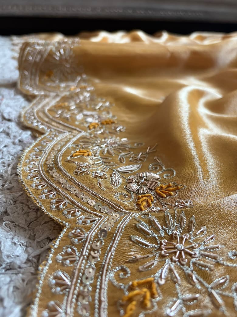 Golden Yellow Pure Zari Banarasi Tissue Silk sarees embellished with intricate zardozi handwork with running designer zardozi