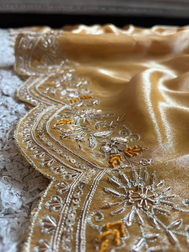 Golden Yellow Pure Zari Banarasi Tissue Silk sarees embellished with intricate zardozi handwork with running designer zardozi