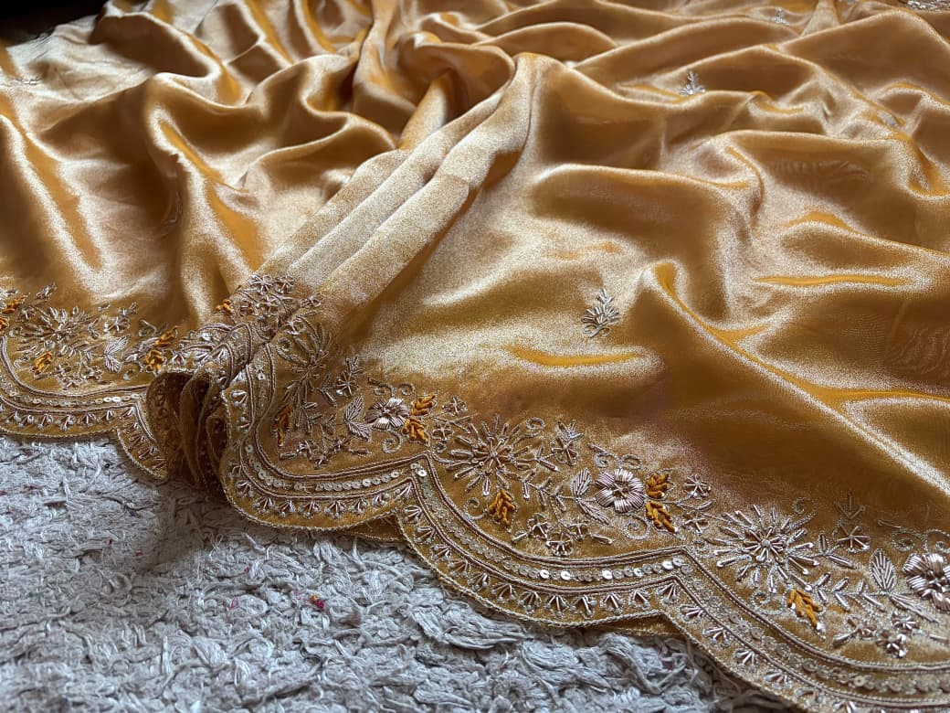 Golden Yellow Pure Zari Banarasi Tissue Silk sarees embellished with intricate zardozi handwork with running designer zardozi