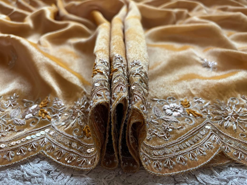 Golden Yellow Pure Zari Banarasi Tissue Silk sarees embellished with intricate zardozi handwork with running designer zardozi