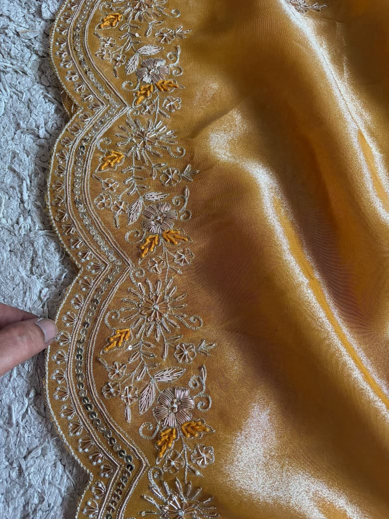 Golden Yellow Pure Zari Banarasi Tissue Silk sarees embellished with intricate zardozi handwork with running designer zardozi