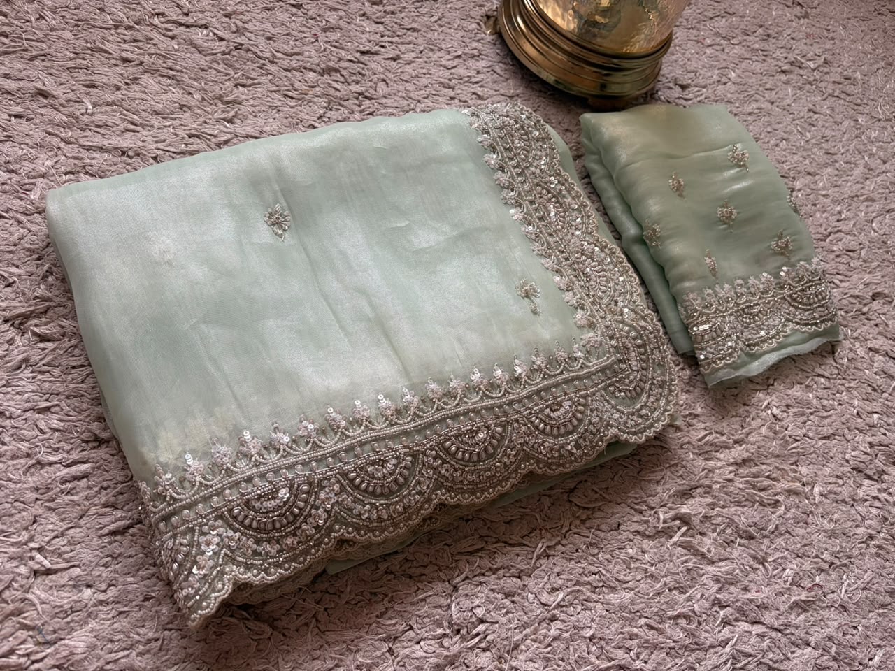Premium Pure Tissue Organza Silk saree embellished with intricate scalloped silver zardozi handwork