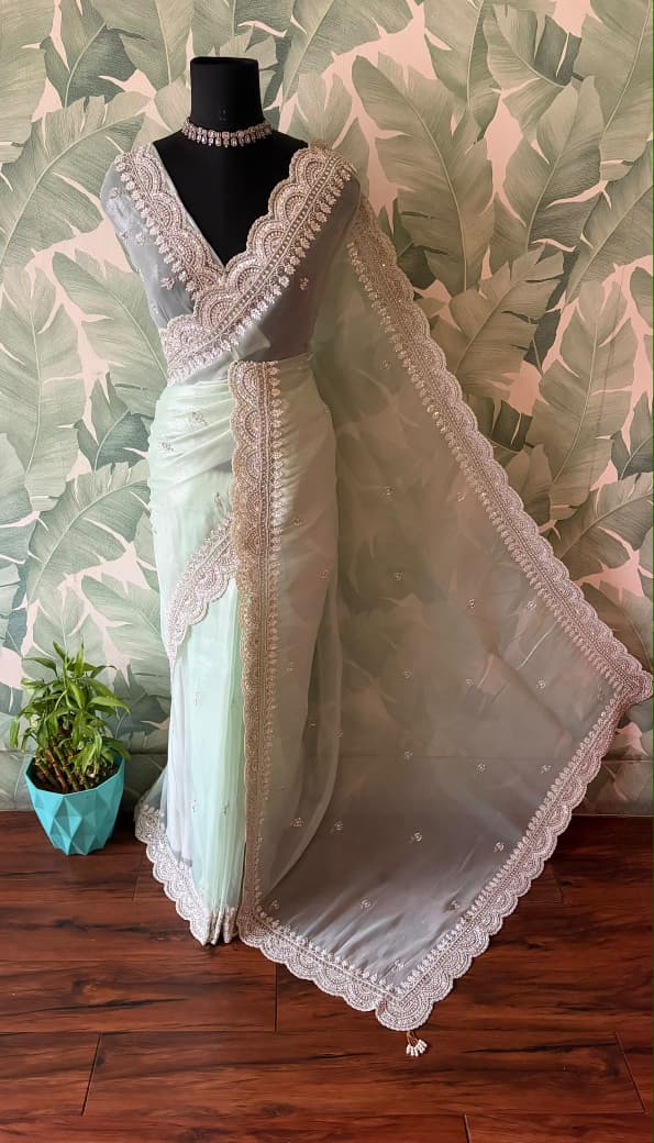 Premium Pure Tissue Organza Silk saree embellished with intricate scalloped silver zardozi handwork