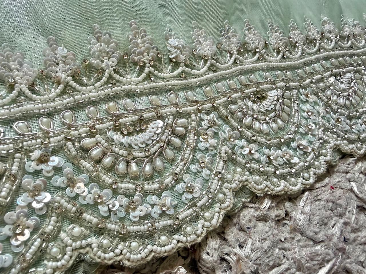 Premium Pure Tissue Organza Silk saree embellished with intricate scalloped silver zardozi handwork