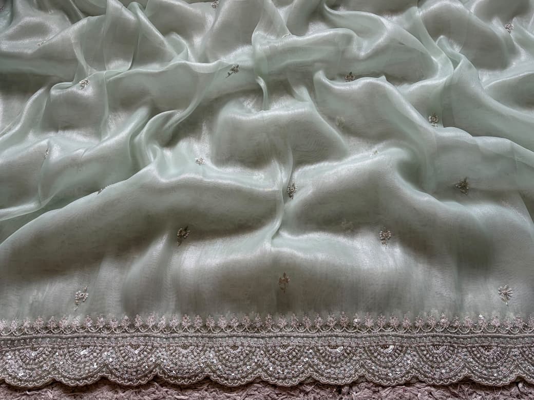 Premium Pure Tissue Organza Silk saree embellished with intricate scalloped silver zardozi handwork