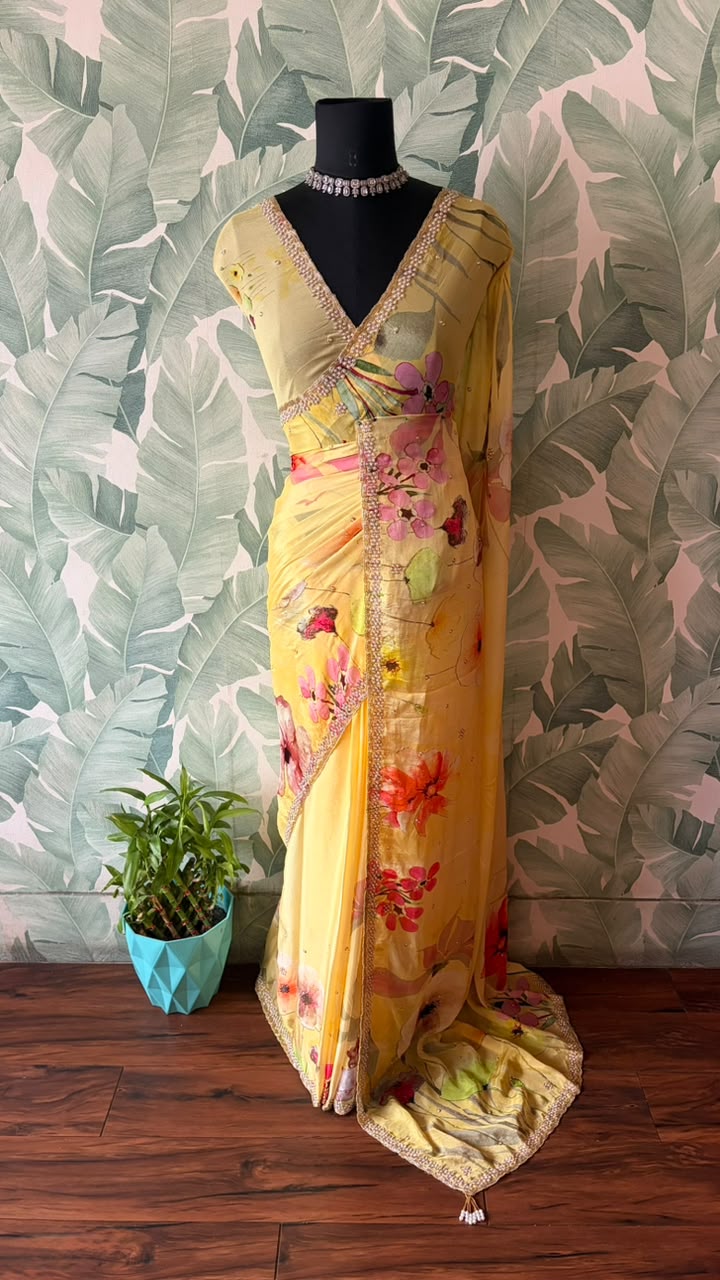 Vibrant yellow designer premium pure chinnon crepe silk saree embellished with zardozi pearl cut daana handwork