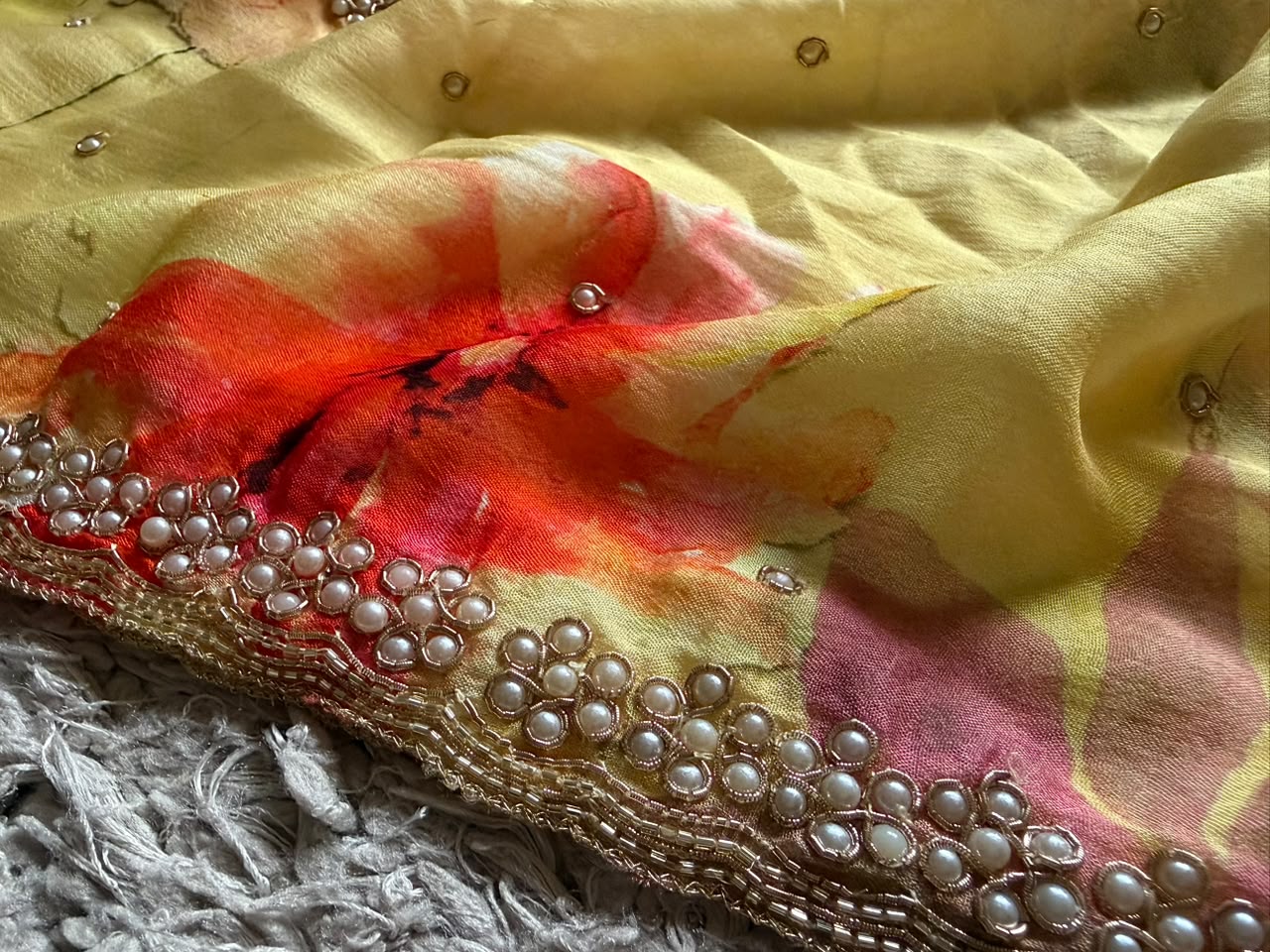 Vibrant yellow designer premium pure chinnon crepe silk saree embellished with zardozi pearl cut daana handwork