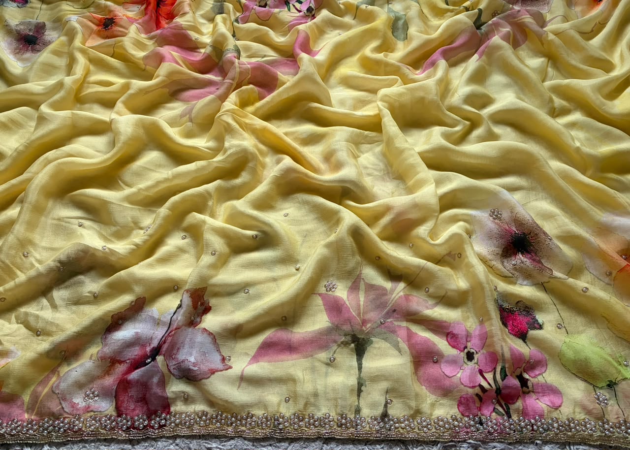 Vibrant yellow designer premium pure chinnon crepe silk saree embellished with zardozi pearl cut daana handwork