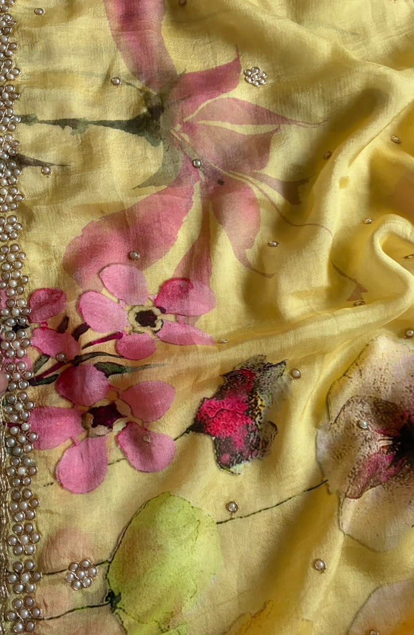 Vibrant yellow designer premium pure chinnon crepe silk saree embellished with zardozi pearl cut daana handwork
