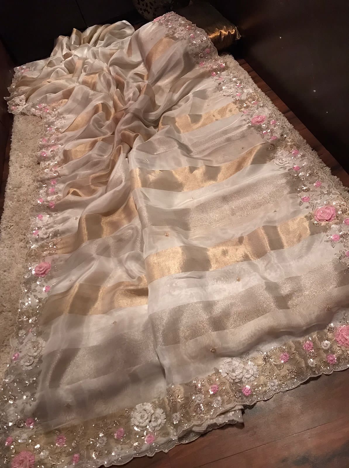 Scintillating Classic Beauty Premium Pure Banarasi Tissue Organza Silk Saree with Silver and Gold Zari Weaving, Pearl Sequins Cut Daana Handwork and Contrast Golden Zari Tissue Floral Handwork Blouse Piece.