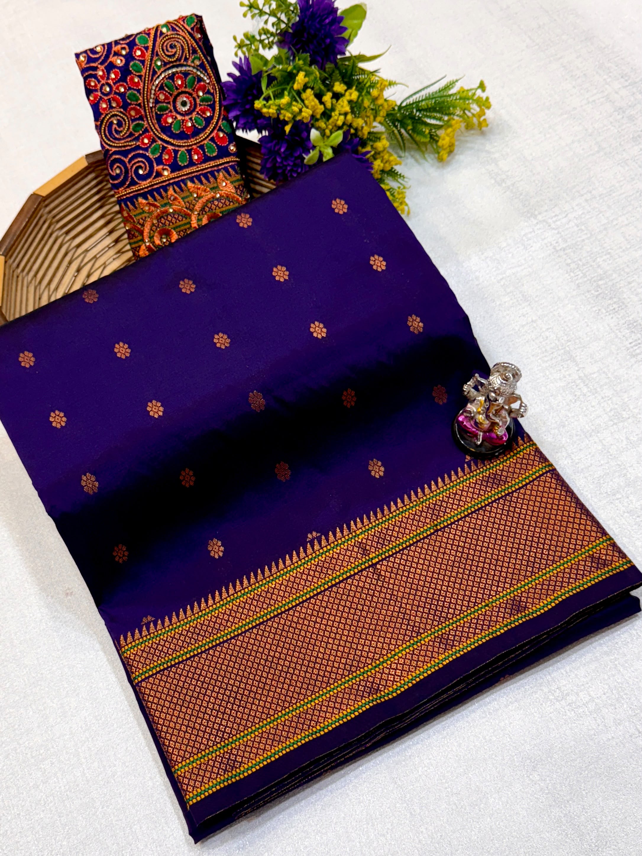 Kajal Kalanjali Paithani premium Tana silk saree with allover zari butti and rich zari pallu.