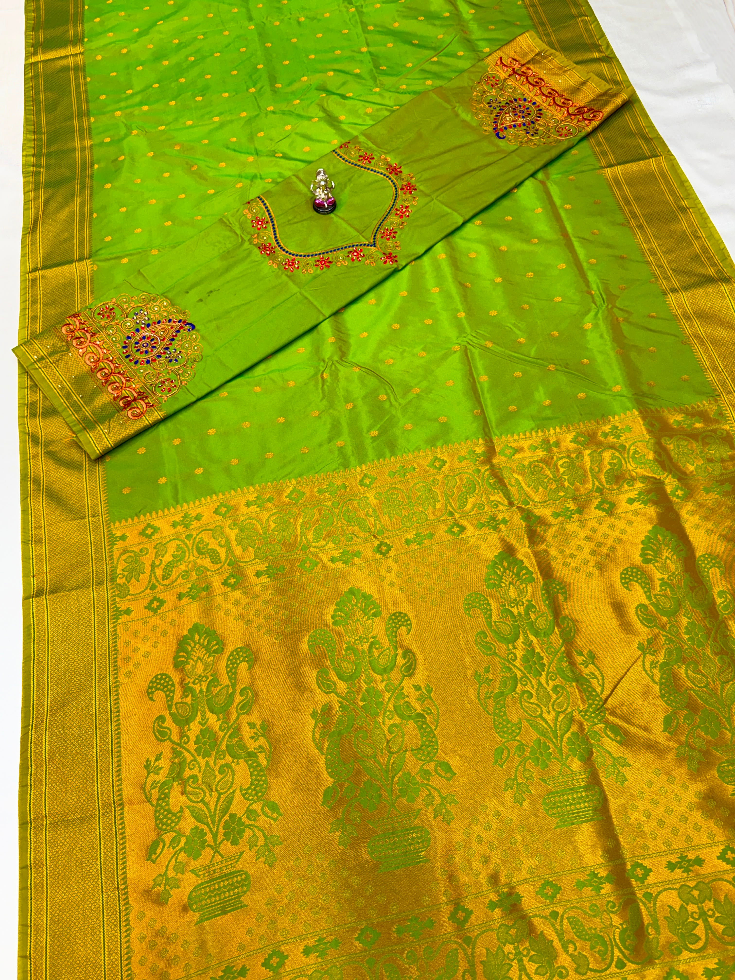 Kajal Kalanjali Paithani premium Tana silk saree with allover zari butti and rich zari pallu.