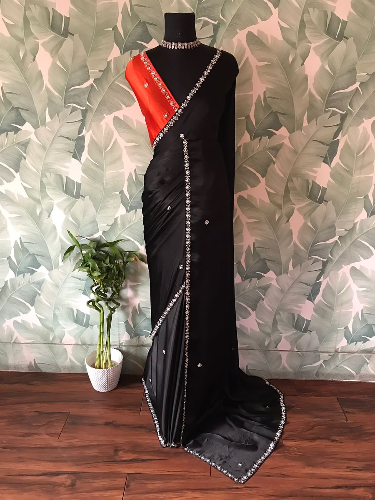 Showstopper Black Premium Pure Chinnon Satin Silk Saree with Intricate Pearl Handwork and Contrast Designer Blouse Piece.