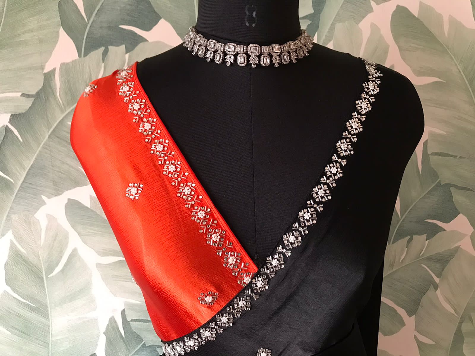 Showstopper Black Premium Pure Chinnon Satin Silk Saree with Intricate Pearl Handwork and Contrast Designer Blouse Piece.