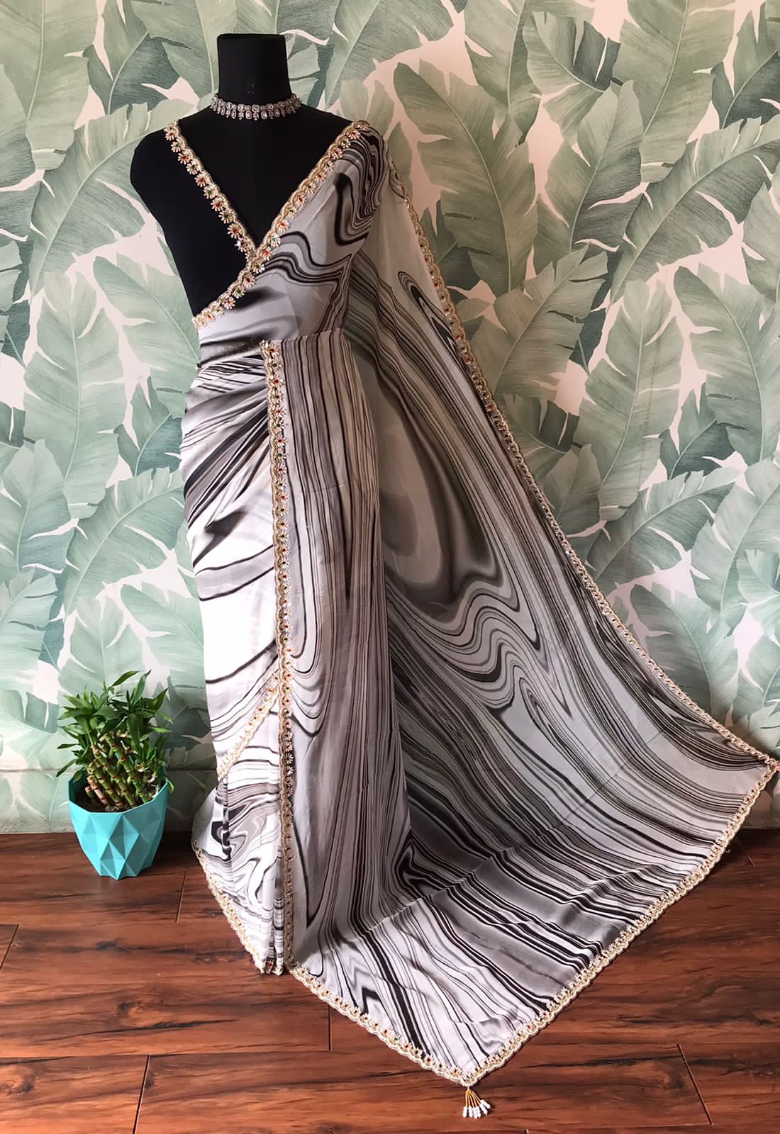 Black and white premium pure georgette silk saree with contemporary digital print, mirror sequins pearl cut daana handwork and contrast black blouse.