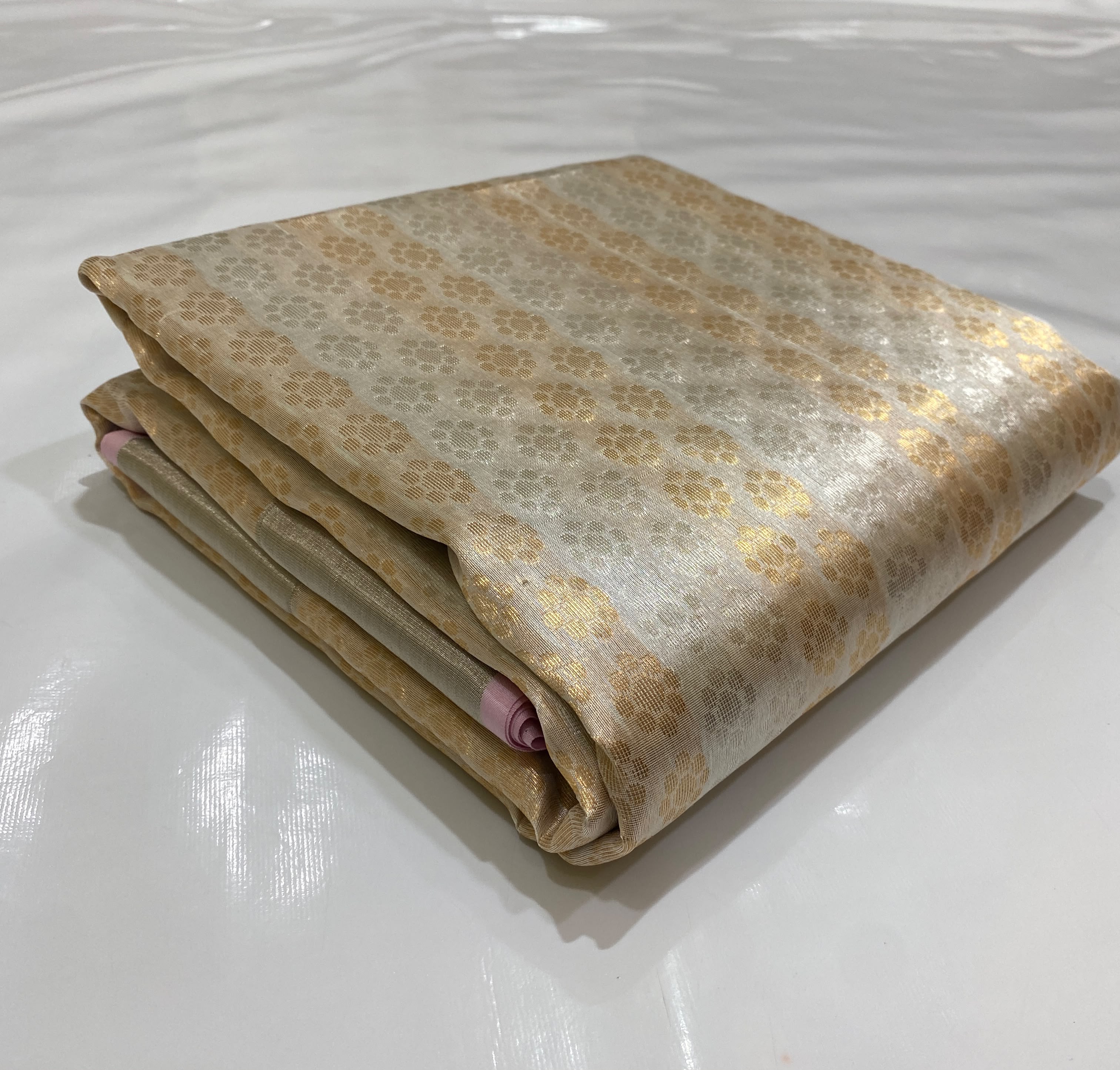 Ivory White Chanderi Handloom Pattu Tissue Silk Saree With Gold Zari Woven Motifs, Elegant Tissue Finish, Rich Woven Border And Matching Blouse Piece.