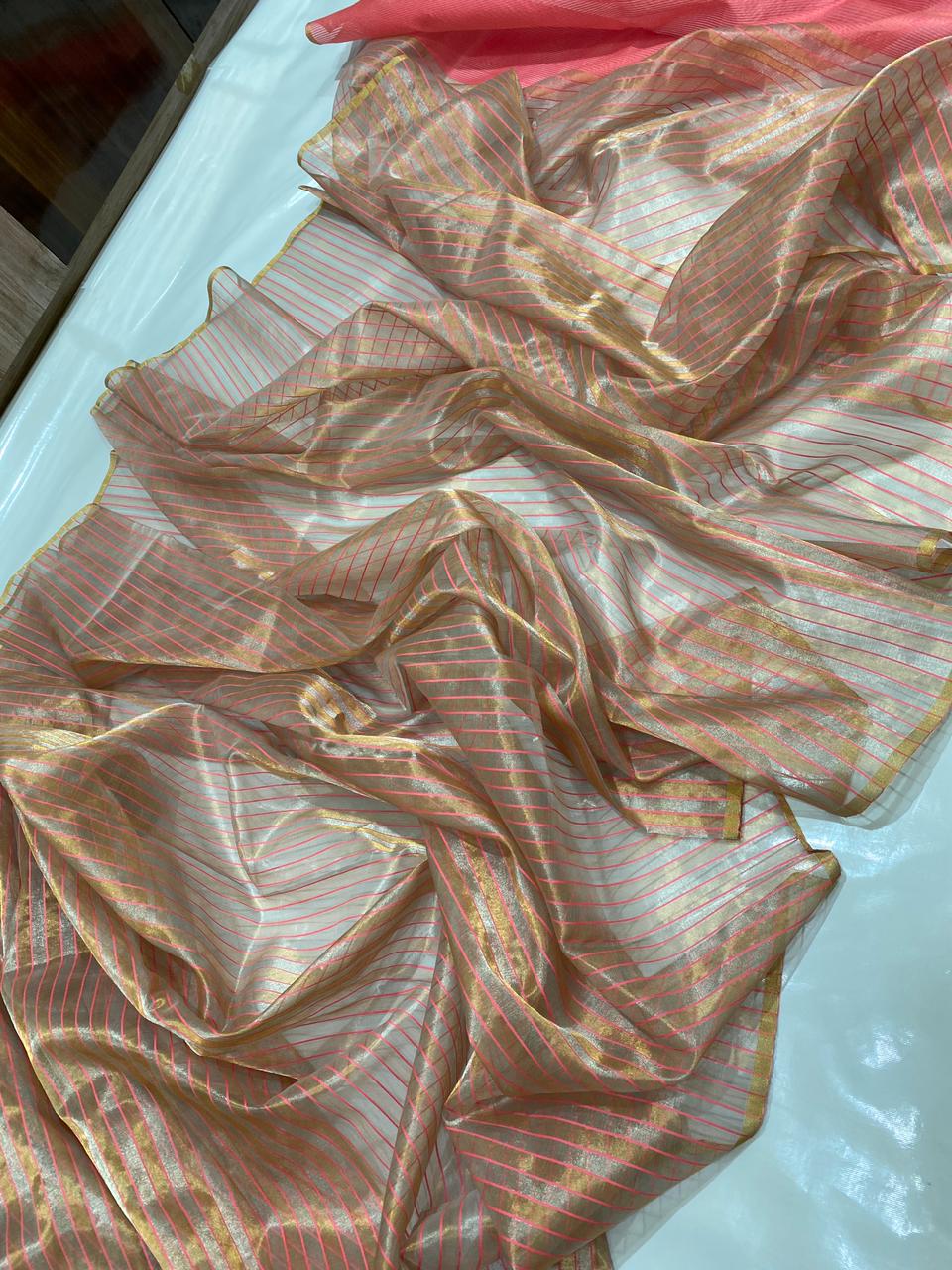 Golden Chanderi Handloom Tissue Silk Saree With Pink Striped Weaving, Rich Pink Pallu, Luxurious Tissue Finish And Matching Blouse Piece.