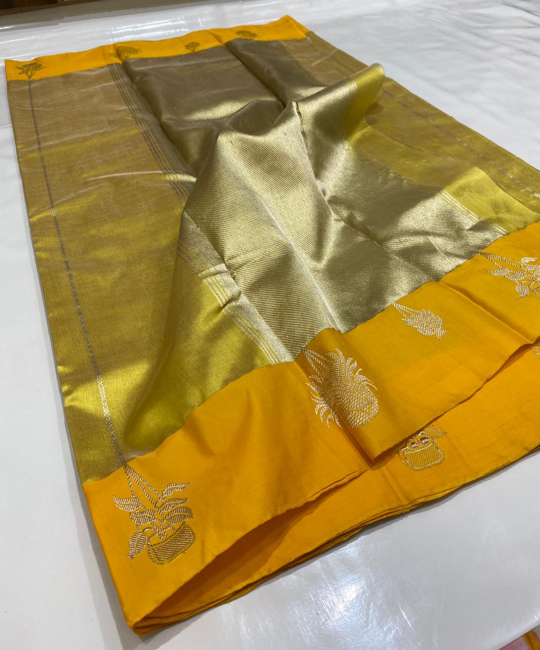 Golden Chanderi Handloom Pattu Tissue Silk Saree With Silver Zari Woven Motifs, Contrast Yellow Border, Rich Tissue Finish And Matching Blouse Piece.