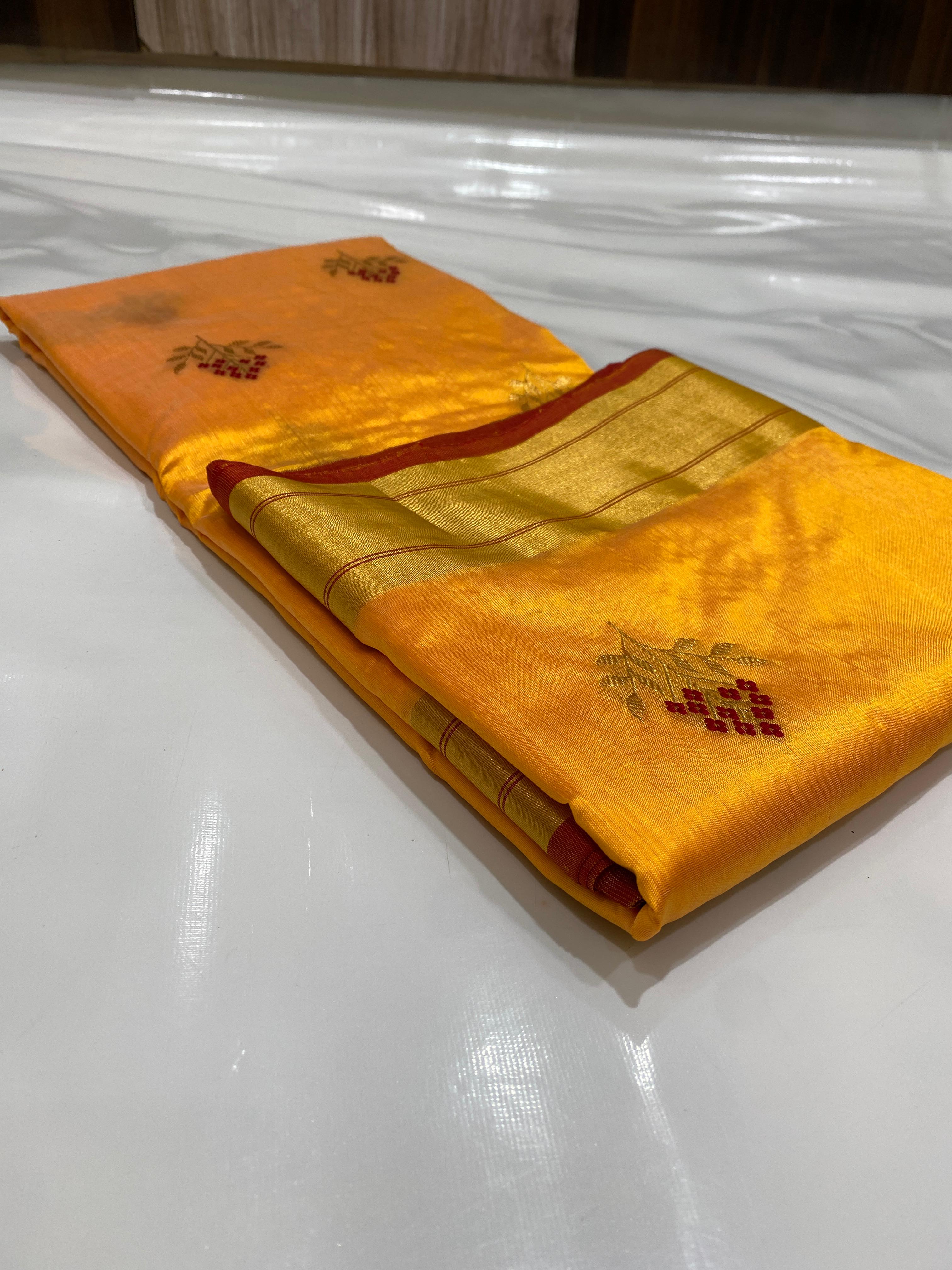 Mustard Yellow Chanderi Handloom Pattu Tissue Silk Saree With Zari Woven Floral Butti, Rich Golden Tissue Pallu, Contrast Border And Matching Blouse Piece.
