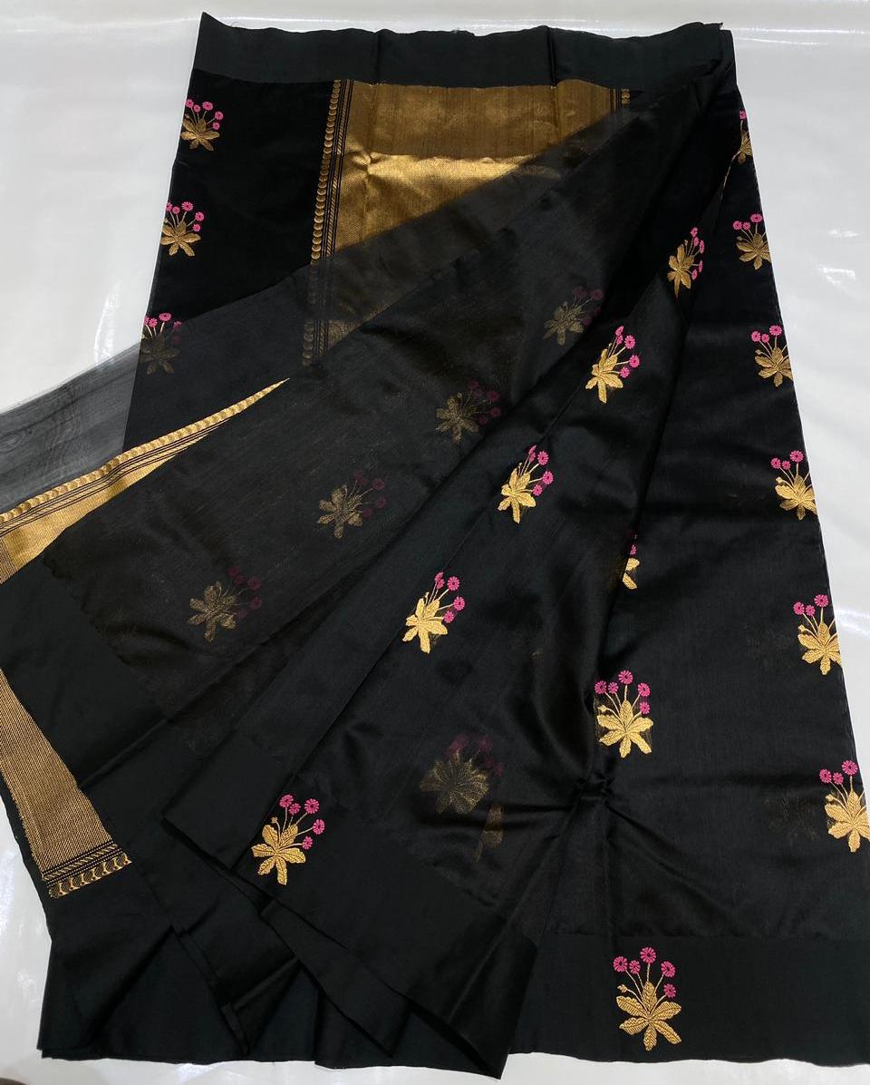 Black Chanderi Handloom Pattu Tissue Silk Saree Golden Border With Pink And Golden Zari Floral Motifs, Rich Tissue Silk Pallu And Matching Blouse Piece.