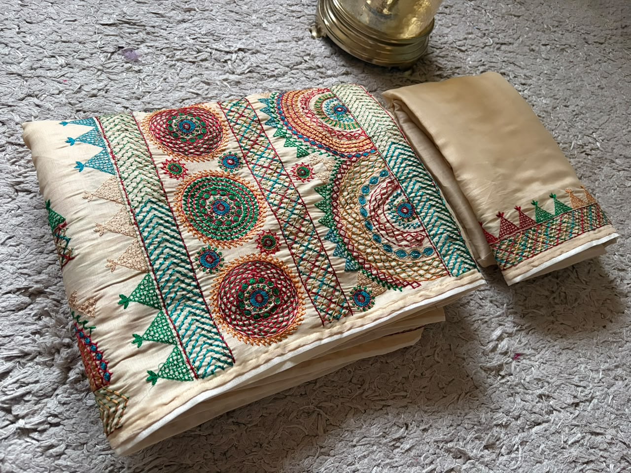 Classy Cream Premium Tussar Silk saree embellished with multi coloured resham thread charismatic Lambani (Banjara) work