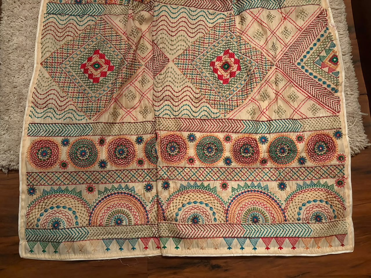 Classy Cream Premium Tussar Silk saree embellished with multi coloured resham thread charismatic Lambani (Banjara) work