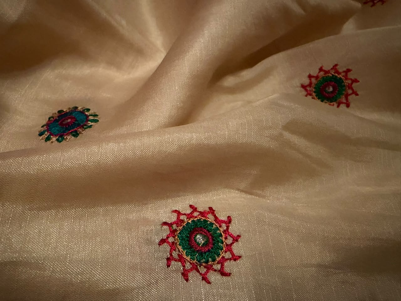 Classy Cream Premium Tussar Silk saree embellished with multi coloured resham thread charismatic Lambani (Banjara) work