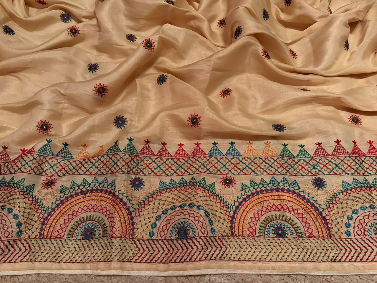 Classy Cream Premium Tussar Silk saree embellished with multi coloured resham thread charismatic Lambani (Banjara) work