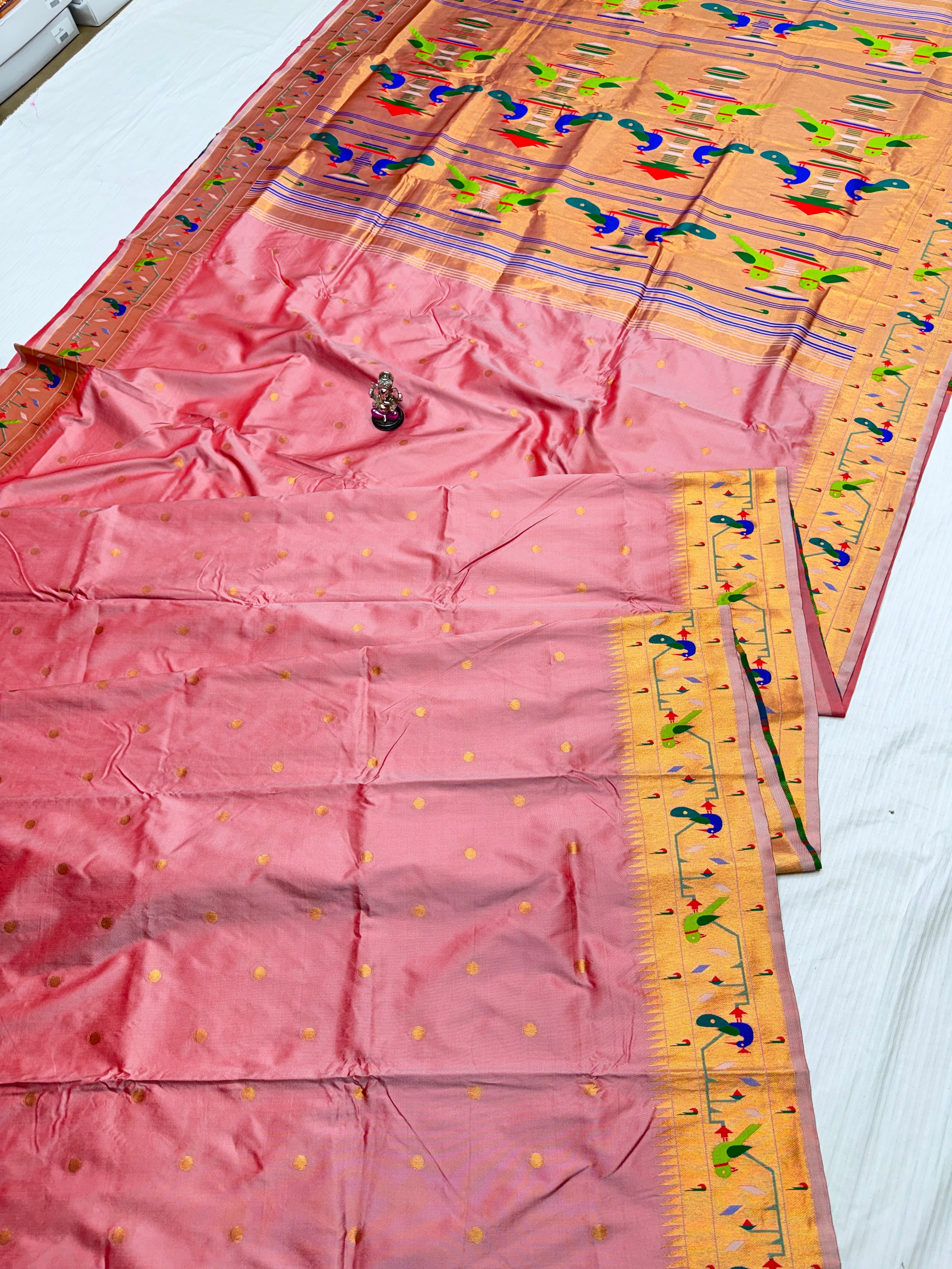 Paithani Saree in premium Katan Silk with a pink body, all-over zari butti, traditional Mor Popat brocade pallu and border, and exclusive running blouse piece, perfect for weddings, festive occasions, and traditional wear.